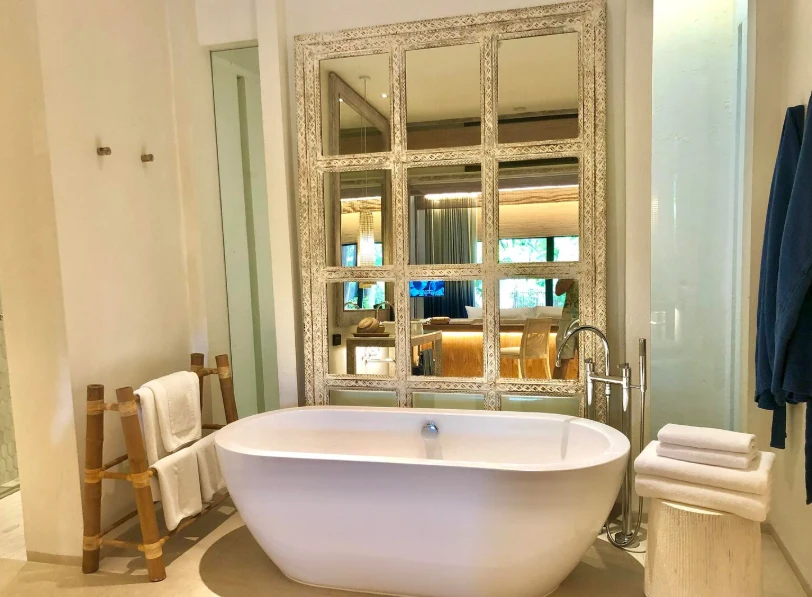 Elegant bathroom remodel with freestanding tub and decorative mirror highlighting bathroom remodel cost in Ventura County