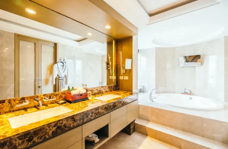 Elegant bathroom remodel with freestanding tub and decorative mirror highlighting bathroom remodel cost in Ventura County