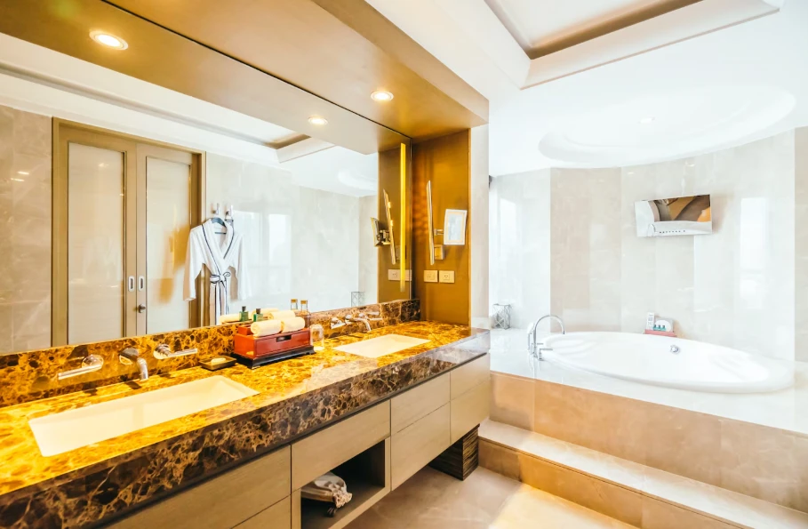 Elegant bathroom remodel with freestanding tub and decorative mirror highlighting bathroom remodel cost in Ventura County