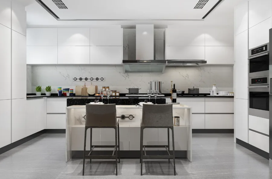 Modern white kitchen with handleless cabinets, marble backsplash, and a waterfall island