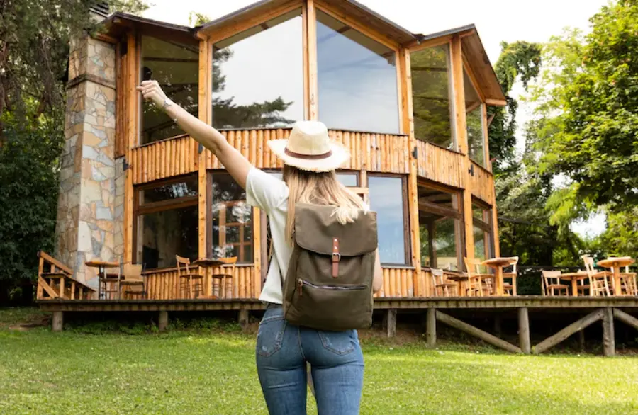 Renter arriving at a detached backyard unit generating ADU rental income in California
