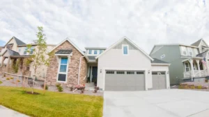Suburban neighborhood homes with attached garages and space for a detached ADU build